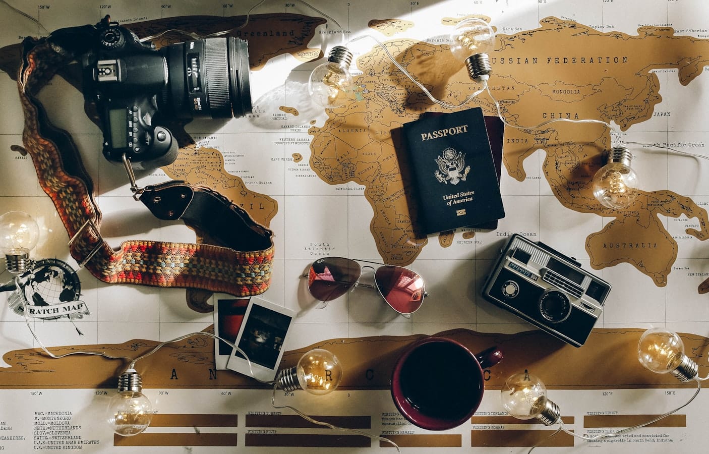 Long-stay traveler planning eSIM coverage with a map and suitcase