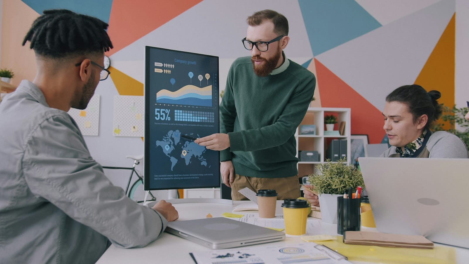 Campaign performance charts in a client review meeting