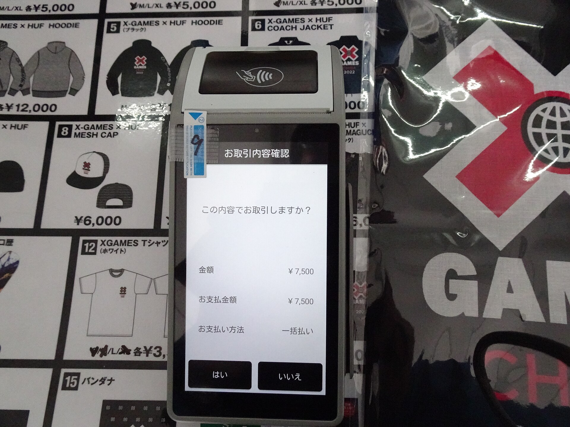 Customer paying with a portable card payment device
