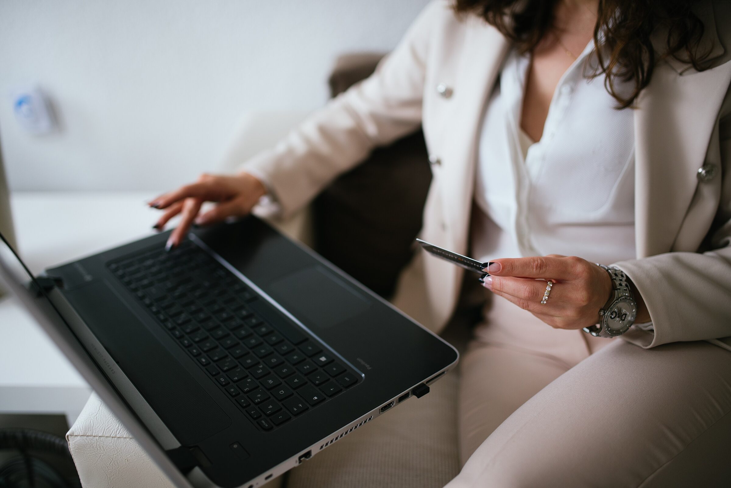 professional shopping online from home workspace with credit card