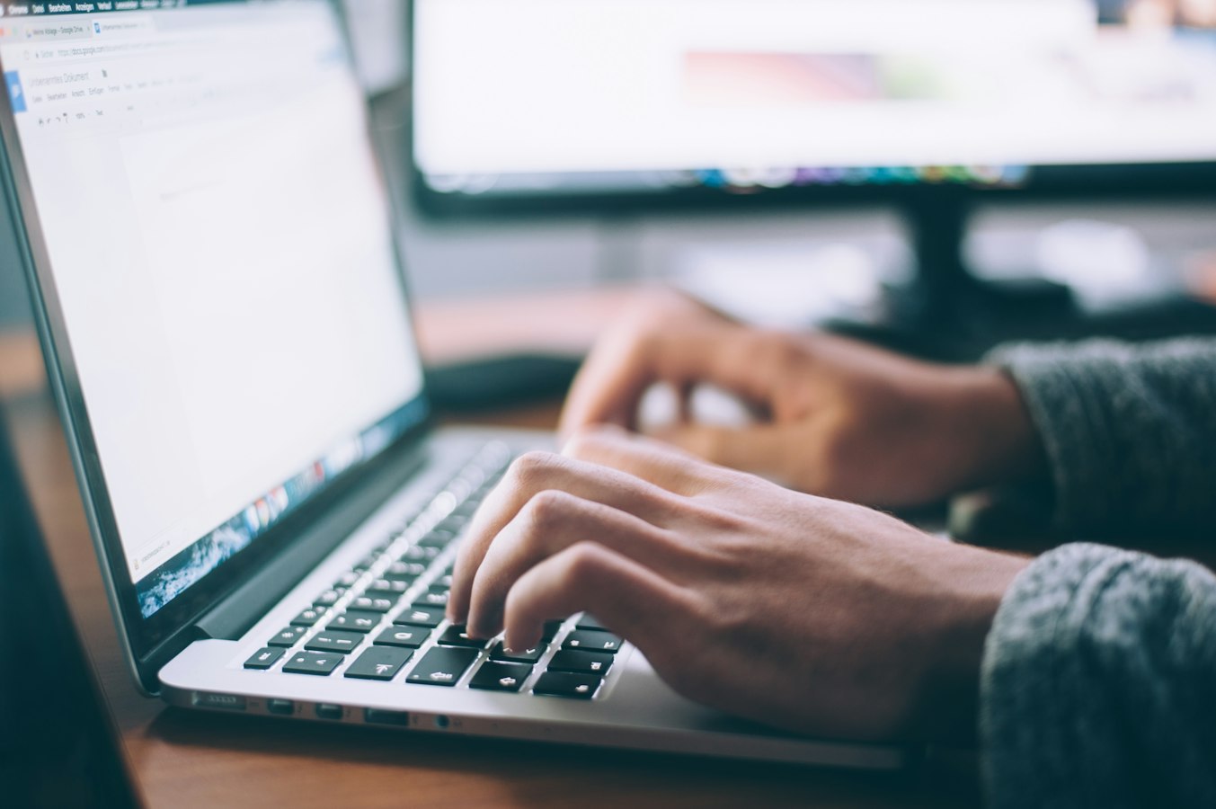 Writing an app description on a laptop